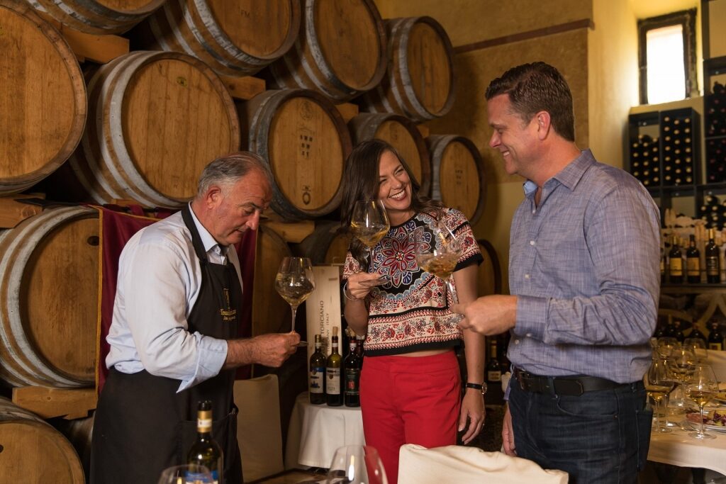 Couple at a wine tasting in Italy