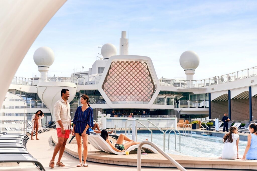 People relaxing aboard Celebrity Cruises' pool deck